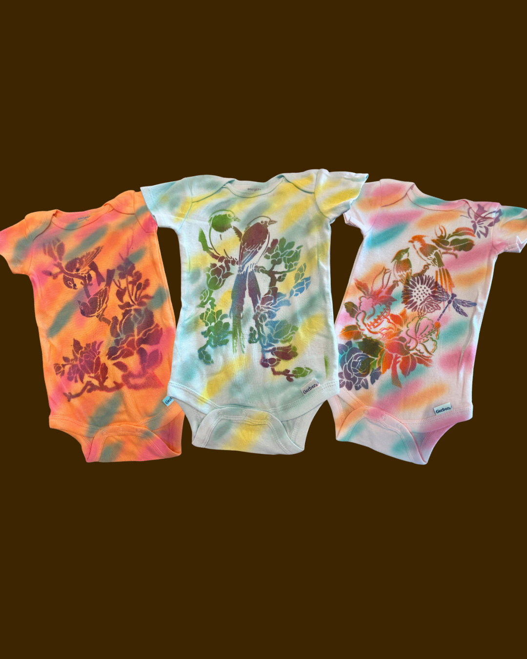 beautiful bird and flower splat color onesie set. (Hand painted)